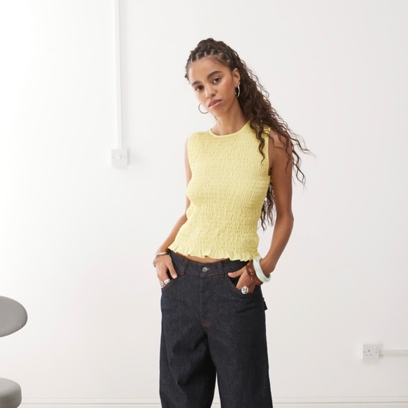 smock shirred sleeveless tank with ruffle edge in yellow - Picture 1 of 5